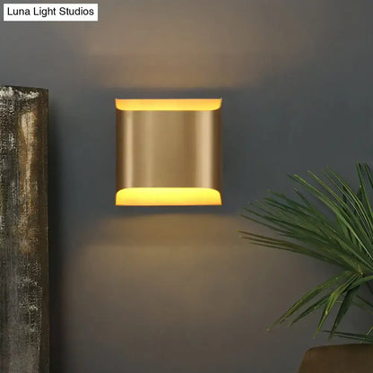 Gold Geometric G9 12-Inch Wall Sconce by Decorbites with brass finish and warm glow on dark wall on Tampa Home & Garden Store