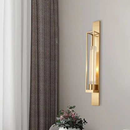 Gold ribbed wall lamp by Decorbites, brass wall sconce with glass tube in a rectangular frame on Tampa Home & Garden Store