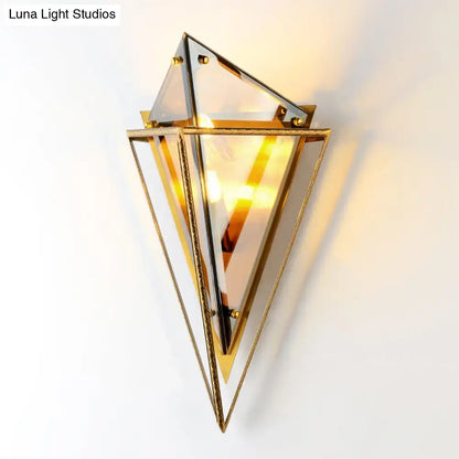 Gold amber wall sconce by Decorbites, geometric diamond glass frame with warm glow on Tampa Home & Garden Store