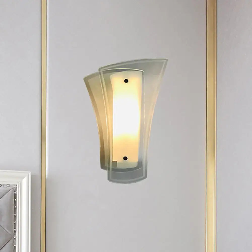 Gold clear glass living room sconce by Decorbites, wall-mounted with warm ambient light on Tampa Home & Garden Store