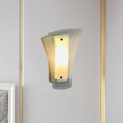 Gold clear glass living room sconce by Decorbites, wall-mounted with warm ambient light on Tampa Home & Garden Store