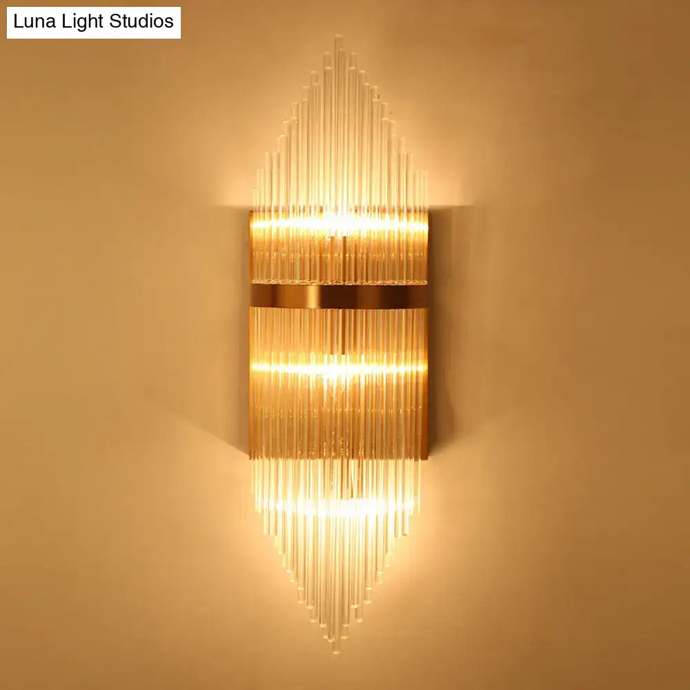 Gold Fluted Glass Sconce by Decorbites with tiered glass tubes, warm glow on Tampa Home & Garden Store