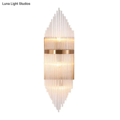Gold Fluted Glass Sconce by Decorbites with a gold band and tiered glass prisms on Tampa Home & Garden Store