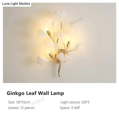 Gold Ginkgo Porcelain Sconce by Decorbites, wall lamp with 12 porcelain leaves and warm light on Tampa Home & Garden Store