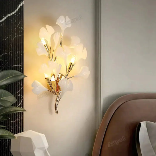 Gold Ginkgo Porcelain Wall Sconce with leaf-shaped lamps, warm LED light by Decorbites on Tampa Home & Garden Store