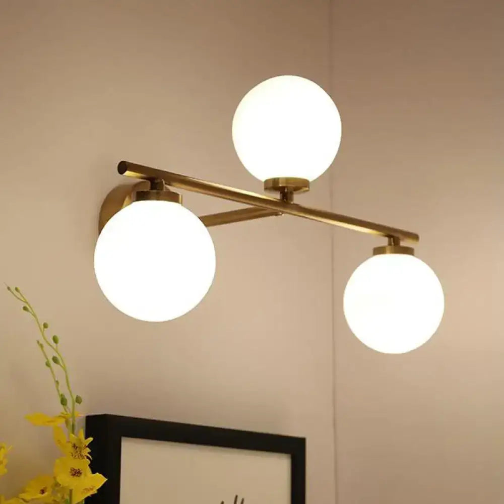 Gold Opal Glass Hallway Sconce by Decorbites, brass finish with three globe lights on wall mount on Tampa Home & Garden Store