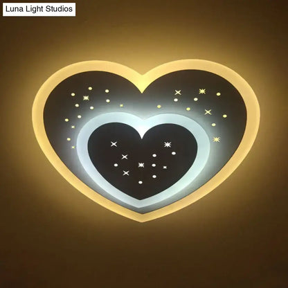 Gold Heart Pendant Wall Light by Decorbites, double nested hearts with warm yellow glow on Tampa Home & Garden Store