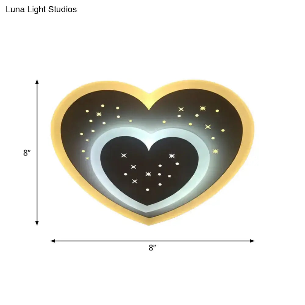Gold heart pendant wall light featuring nested inner hearts and starry glow, Decorbites on Tampa Home & Garden Store