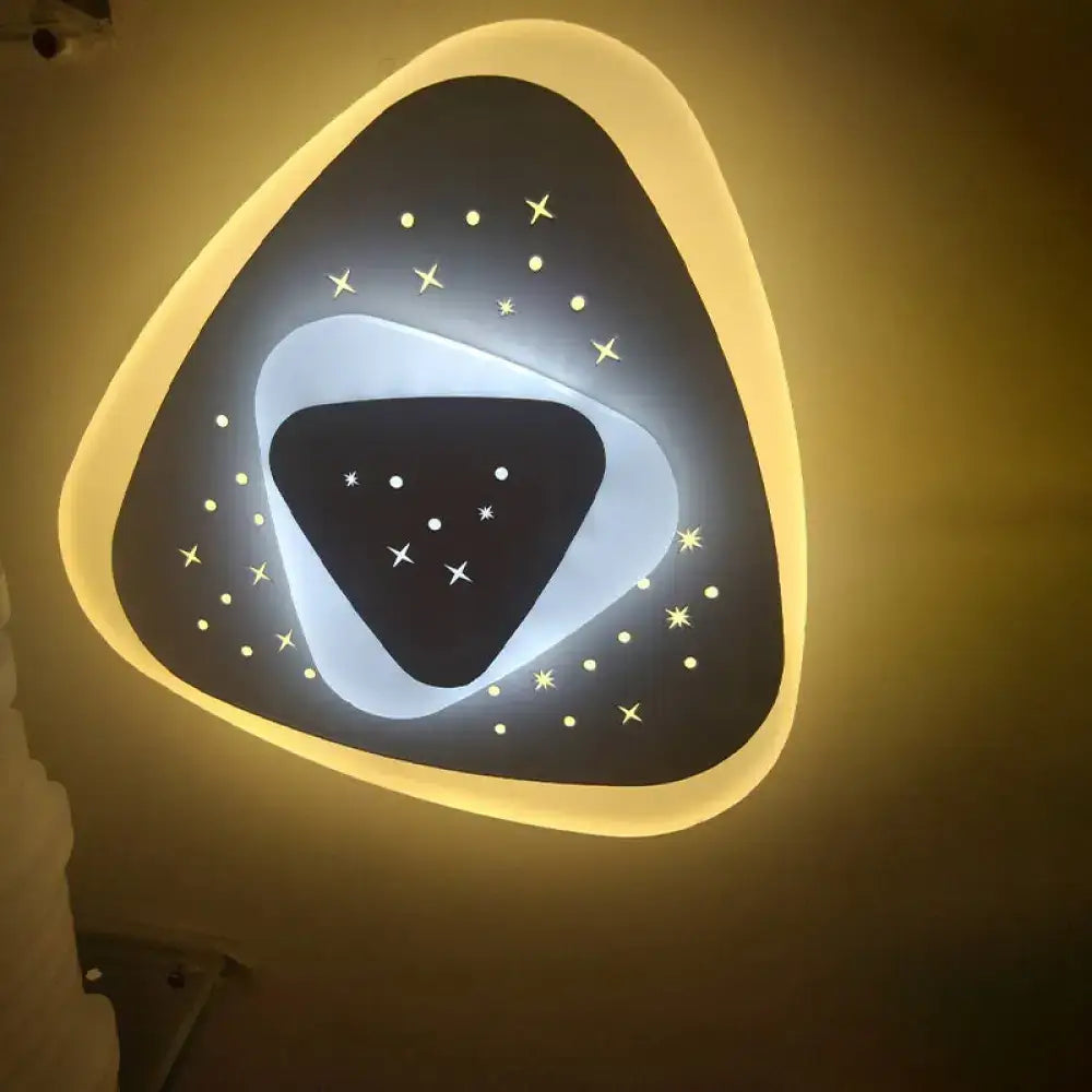 Gold Heart Pendant Wall Light by Decorbites; gold finish with star cutouts and warm glow on Tampa Home & Garden Store