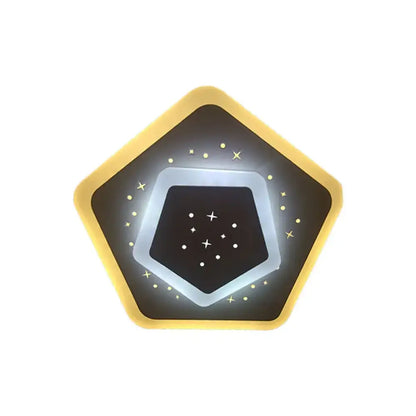 Gold heart pendant wall light with dark center and starry accents on Tampa Home & Garden Store