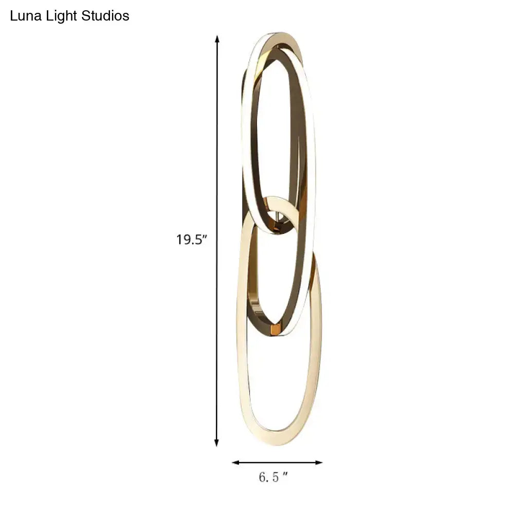 Gold oval wall lamp with interlocking rings, modern gold finish by Decorbites on Tampa Home & Garden Store