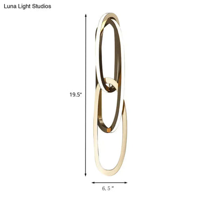 Gold oval wall lamp with interlocking rings, modern gold finish by Decorbites on Tampa Home & Garden Store