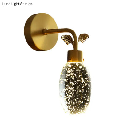 Gold Crystal Globe Seeded Sconce; brass wall mount, leaf accents, bubbled glass globe on Tampa Home & Garden Store