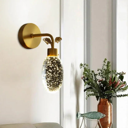 Gold Crystal Globe Seeded Sconce wall light with a gold arm and bubble glass globe Decorbites on Tampa Home & Garden Store