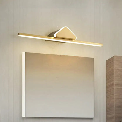 Gold LED vanity wall light by Decorbites, slim bar with triangular backplate above mirror on Tampa Home & Garden Store