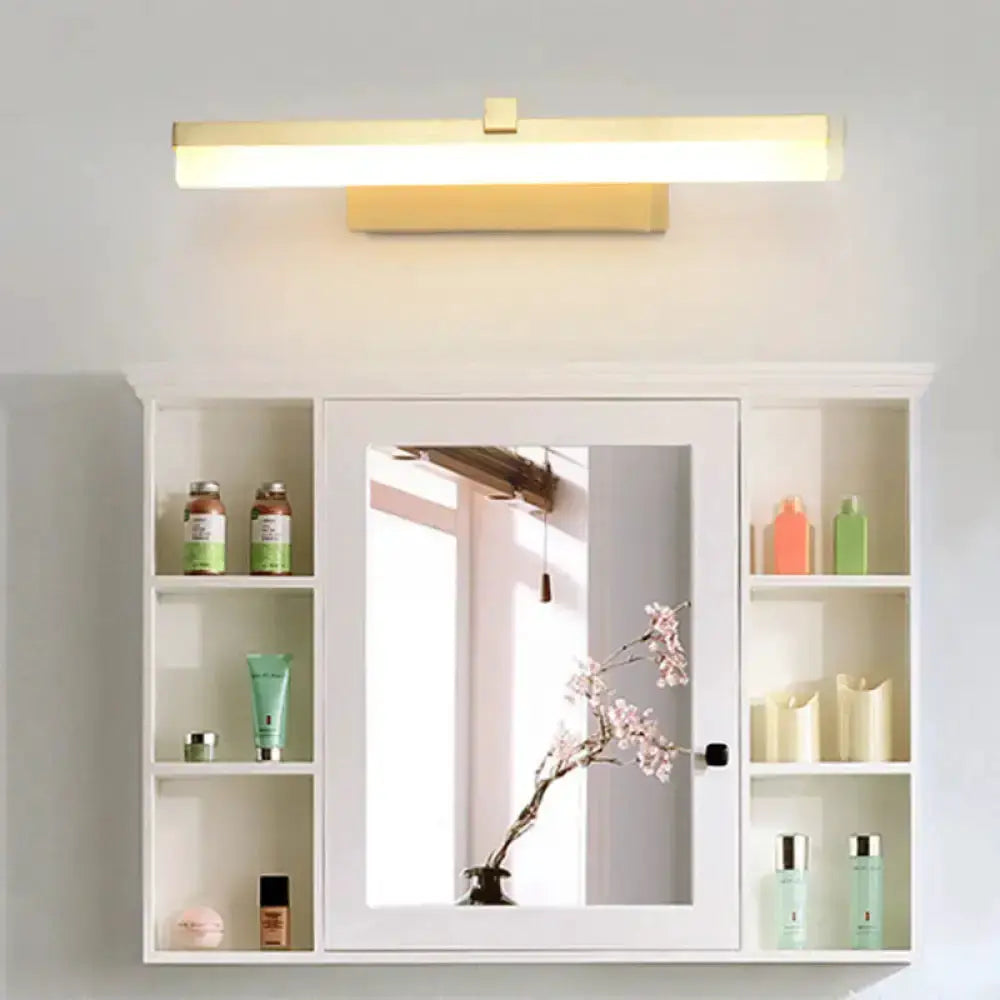 Modern gold LED vanity 16 inch wall sconce over white bathroom cabinet with mirror on Tampa Home & Garden Store