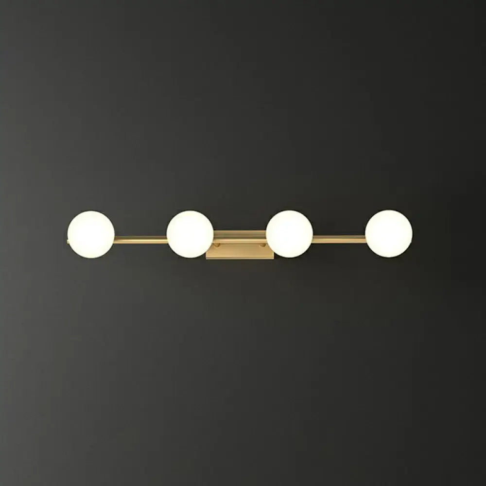 Gold Milky Glass Bathroom Five-Light Sconce by Decorbites with four globe lights on gold bar on Tampa Home & Garden Store
