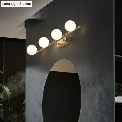 Decorbites gold milky-glass bathroom five-light sconce with round globes on Tampa Home & Garden Store