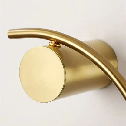 Gold brass LED wall light sconce with curved arm for bedside decor by Decorbites on Tampa Home & Garden Store