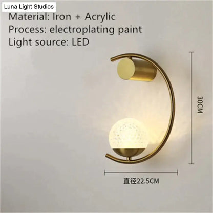 Wall light Decorbites modern gold LED bedside sconce with curved arc and dual globe shades on Tampa Home & Garden Store