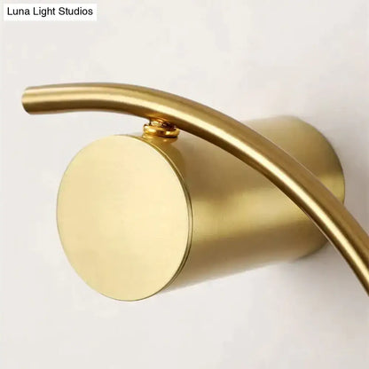 Gold LED bedside wall light with curved arm and round backplate, Luna Light Studios watermark on Tampa Home & Garden Store