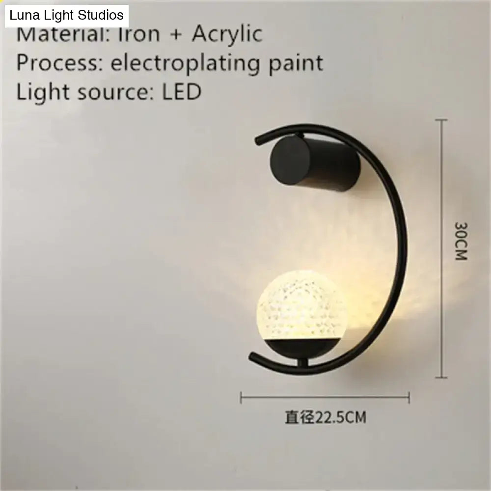 Wall light Decorbites black arc LED bedside sconce with textured glass globe on Tampa Home & Garden Store