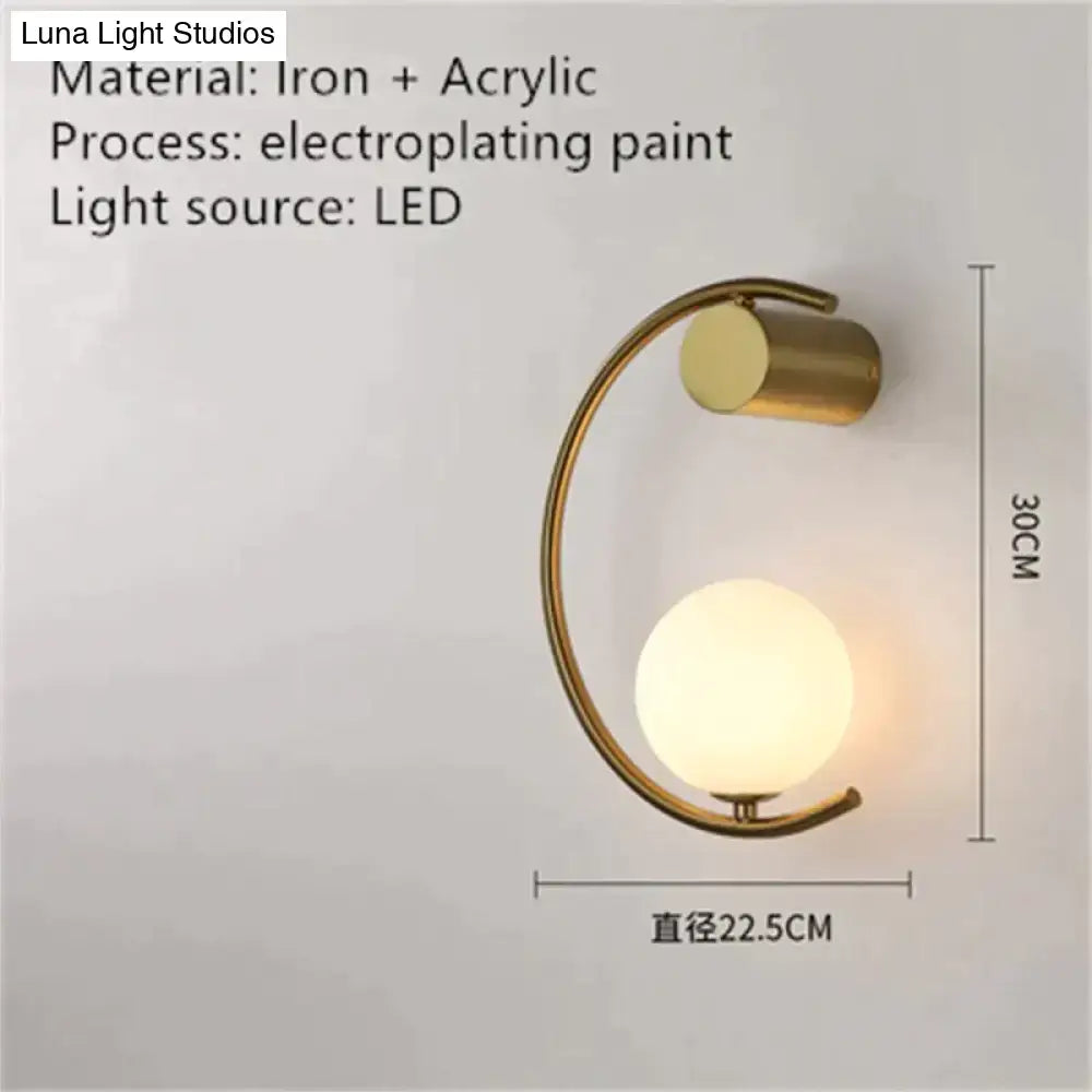 Gold crescent-frame wall light with frosted glass orb LED bedside sconce 30cm tall on Tampa Home & Garden Store