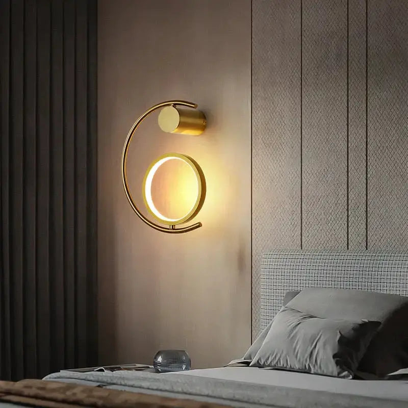 Modern gold LED bedside wall lamp sconce by Decorbites with circular ring design on Tampa Home & Garden Store