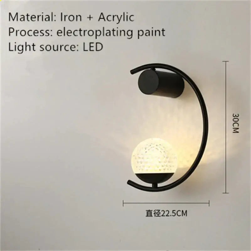 Modern gold LED bedside wall lamp sconce with iron frame and glass orb by Decorbites on Tampa Home & Garden Store