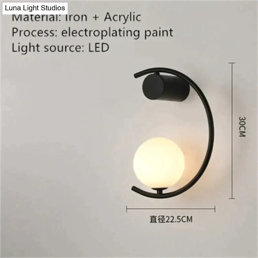 Wall light black curved crescent frame with frosted glass orb LED bedside sconce on Tampa Home & Garden Store