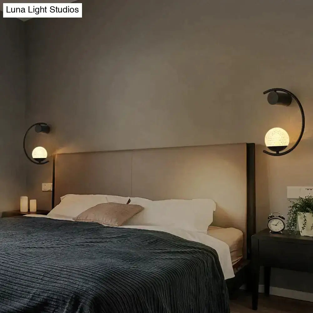 Modern gold LED bedside wall lamp sconce pair with arc arms and white glass globes on Tampa Home & Garden Store