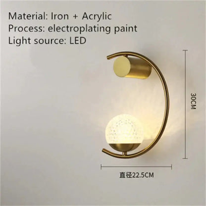 Decorbites wall light sconce: modern gold curved iron frame with LED globe on Tampa Home & Garden Store