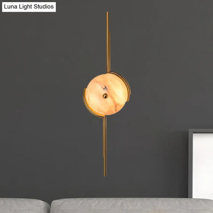 Gold Marble LED Wall Light by Decorbites, gold metal wall with marble disc, warm glow on Tampa Home & Garden Store