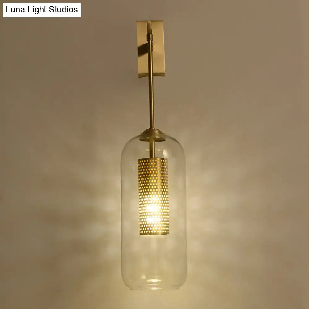 Gold Mesh Wall Sconce with clear glass cylinder shade and perforated brass inner sleeve by Decorbites on Tampa Home & Garden Store