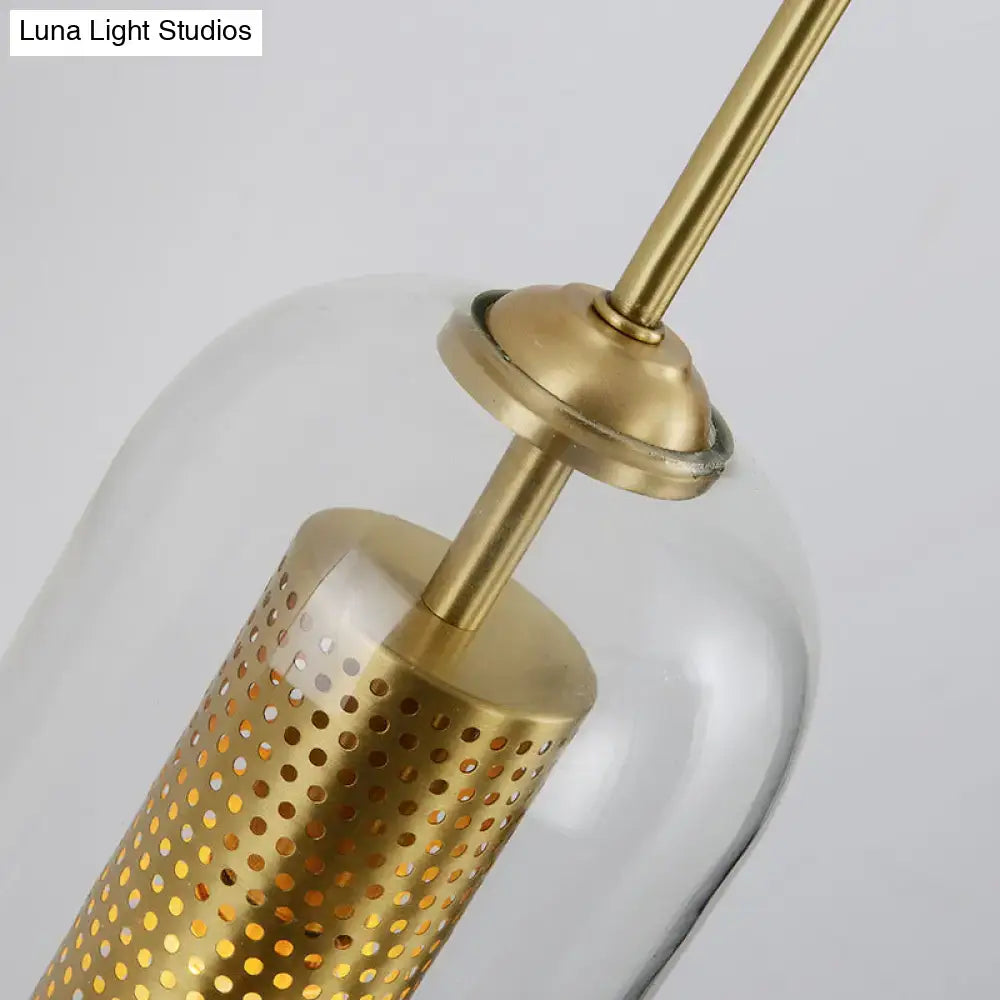 Decorbites Gold Mesh Wall Sconce with brass hardware and perforated shade on Tampa Home & Garden Store