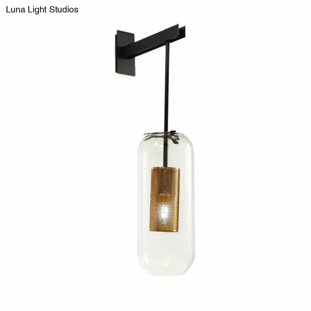 Gold Mesh Glass Sconce with clear glass shade on black wall mount on Tampa Home & Garden Store