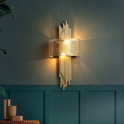 Decorbites gold mesh dual-head sconce lamp with sunburst top and vertical metal accents on Tampa Home & Garden Store