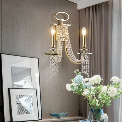 Gold Crystal Candle Sconce with dual bulbs and hanging crystal strands Decorbites on Tampa Home & Garden Store