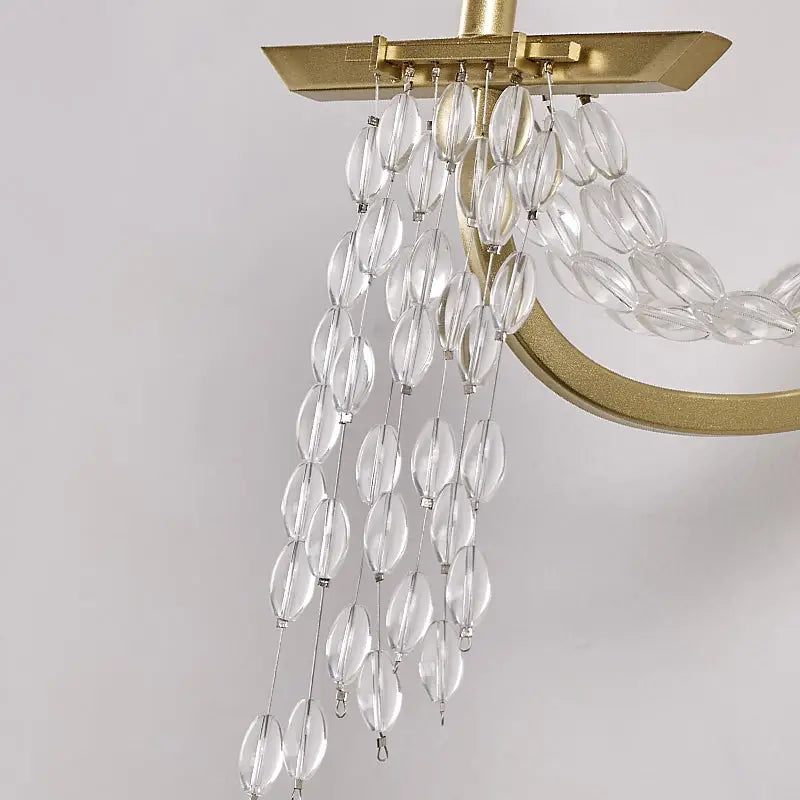 Gold crystal candle sconce with hanging clear glass bead strands by Decorbites on Tampa Home & Garden Store