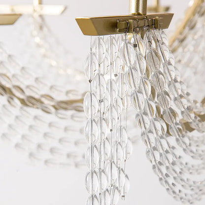 Gold crystal candle sconce by Decorbites with hanging faceted glass discs on Tampa Home & Garden Store