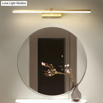 Gold LED vanity light with a slim gold bar fixture, wall-mounted above a round mirror on Tampa Home & Garden Store