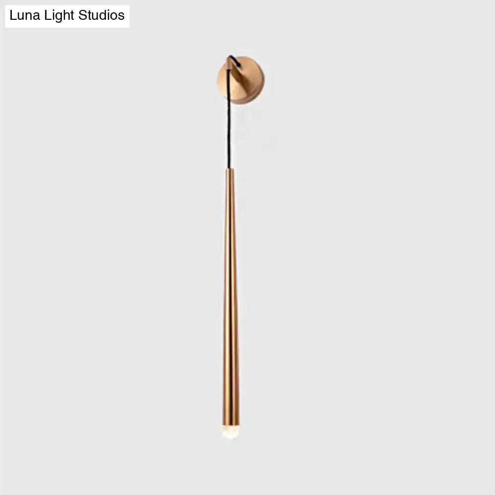 Gold tapered shade sconce by Decorbites with black cord and round wall mount on Tampa Home & Garden Store