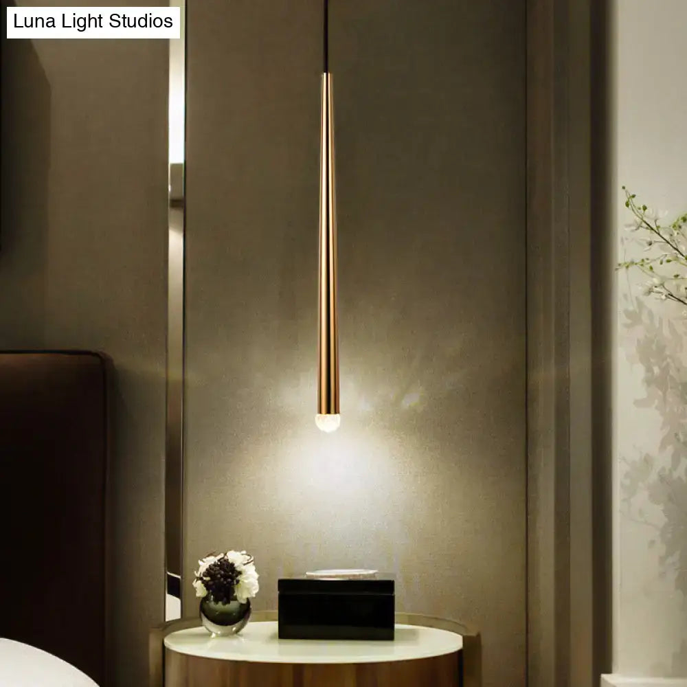 Gold tapered shade sconce by Decorbites on wall above a round side table with a small plant on Tampa Home & Garden Store