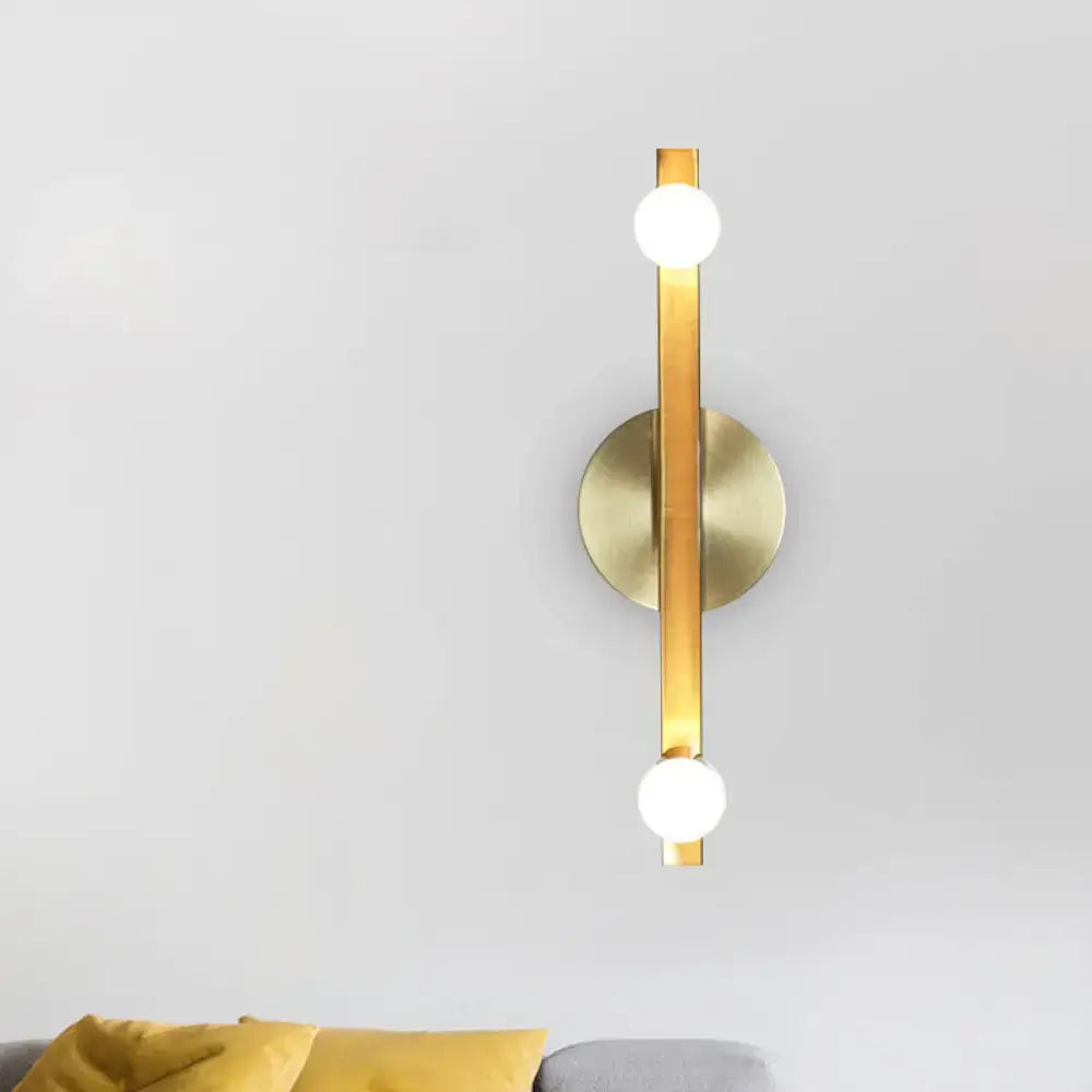 Gold Linear Warm Glow Vanity Light by Decorbites, brass wall sconce with two globe bulbs on Tampa Home & Garden Store