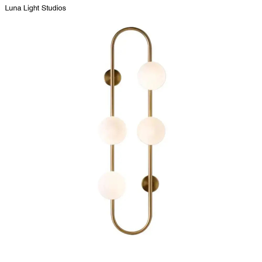 Gold Milky Glass Sconce wall light with brass frame and 4 milky-glass spheres by Decorbites on Tampa Home & Garden Store
