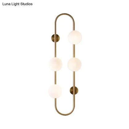 Gold Milky Glass Sconce wall light with brass frame and 4 milky-glass spheres by Decorbites on Tampa Home & Garden Store