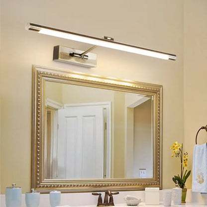 Modern gold minimalist LED bathroom vanity sconce, horizontal metal bar above mirror on Tampa Home & Garden Store