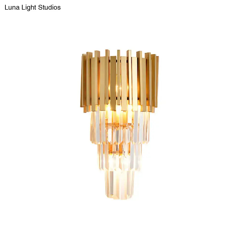 Gold crystal prism wall light with tiered gold bands and hanging crystal prisms on Tampa Home & Garden Store