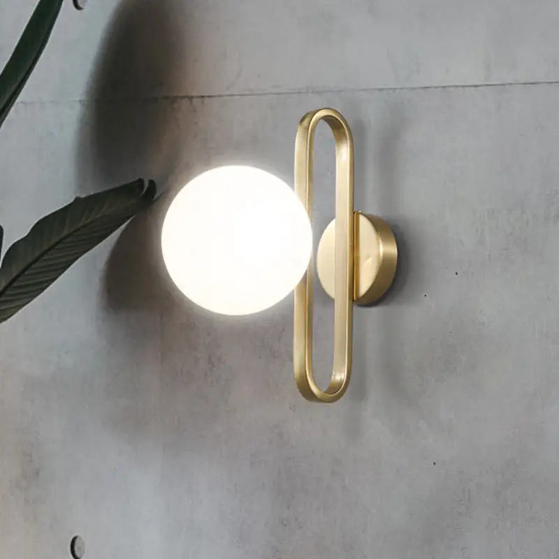 Gold Opal Glass Sphere Wall Lamp on gold-tone metal oval frame by Decorbites on Tampa Home & Garden Store
