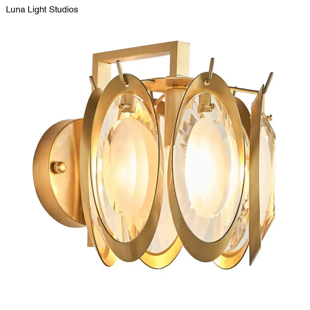 Modern gold oval crystal wall light fixture with crystal discs Decorbites on Tampa Home & Garden Store